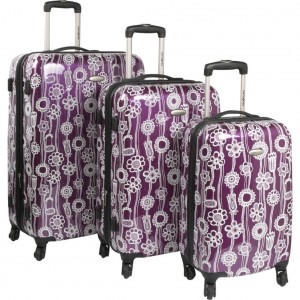 Purple Samsonite floral luggage