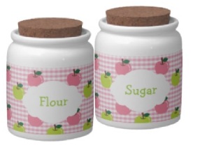 Girly pink gingham pattern and apples flour and sugar jars